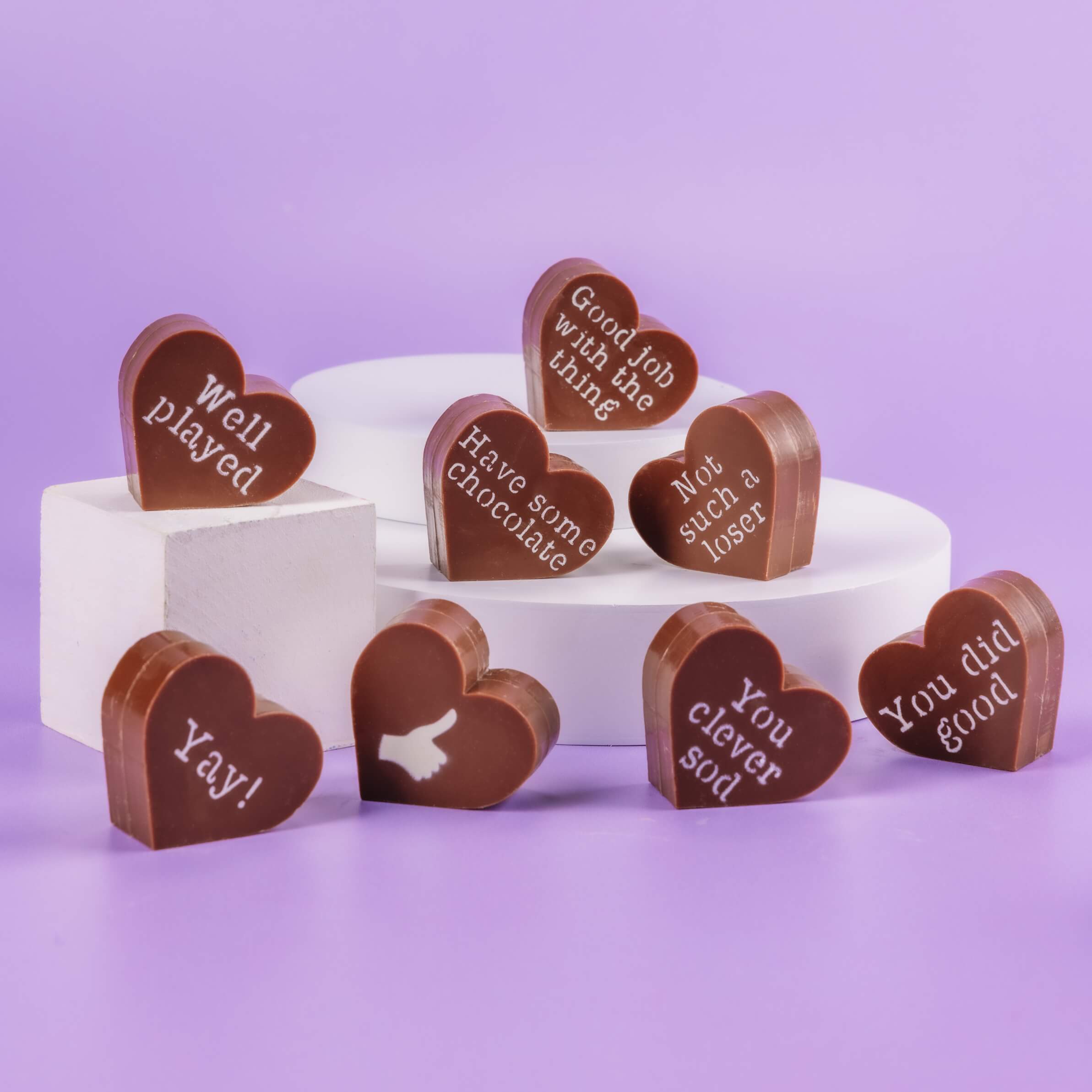 Congratulations Chocolate Gift – eight Obnoxious Chocs hearts, each decorated with a playful congratulations message, perfect for celebrating wins with a grin.