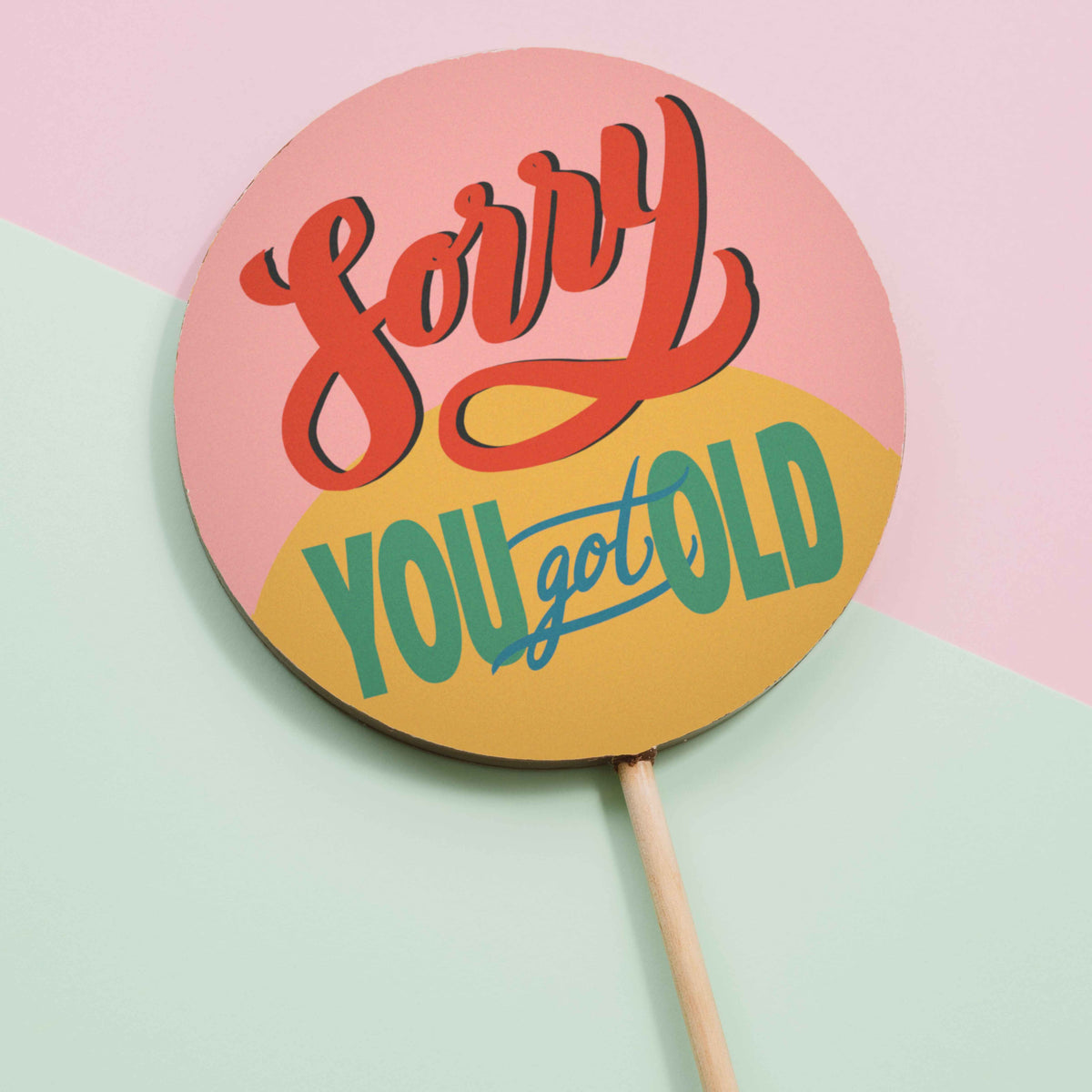 A close up of the chunky milk chocolate body of our 'Sorry You Gold Old' birthday lolly