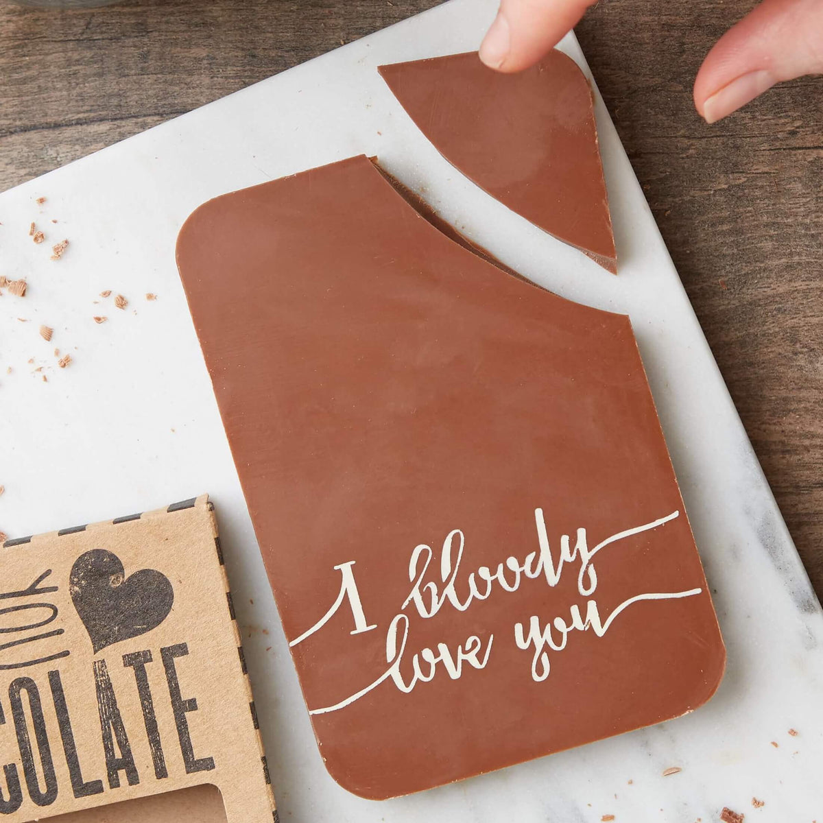 Funny gift for friend – A chunky Belgian milk chocolate bar with ‘I bloody love you’ written on the front, being snapped into pieces.  Perfect for sharing (or not).