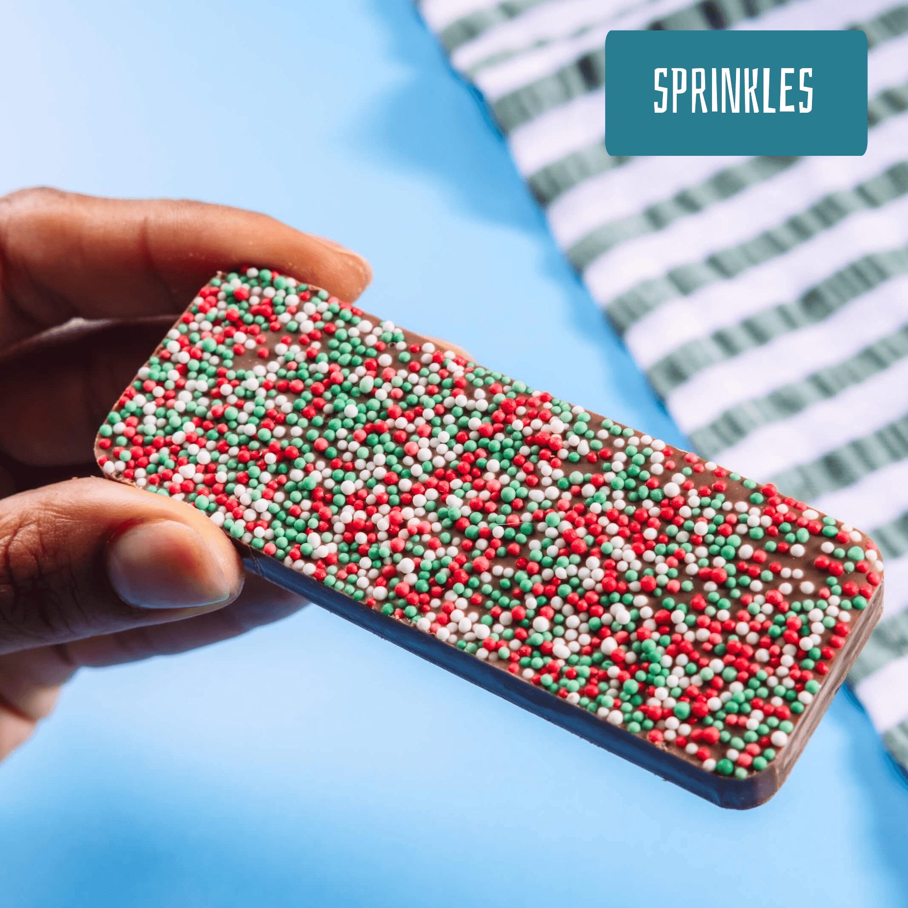 A scrummy Belgian milk chocolate bar packed with colourful sprinkles