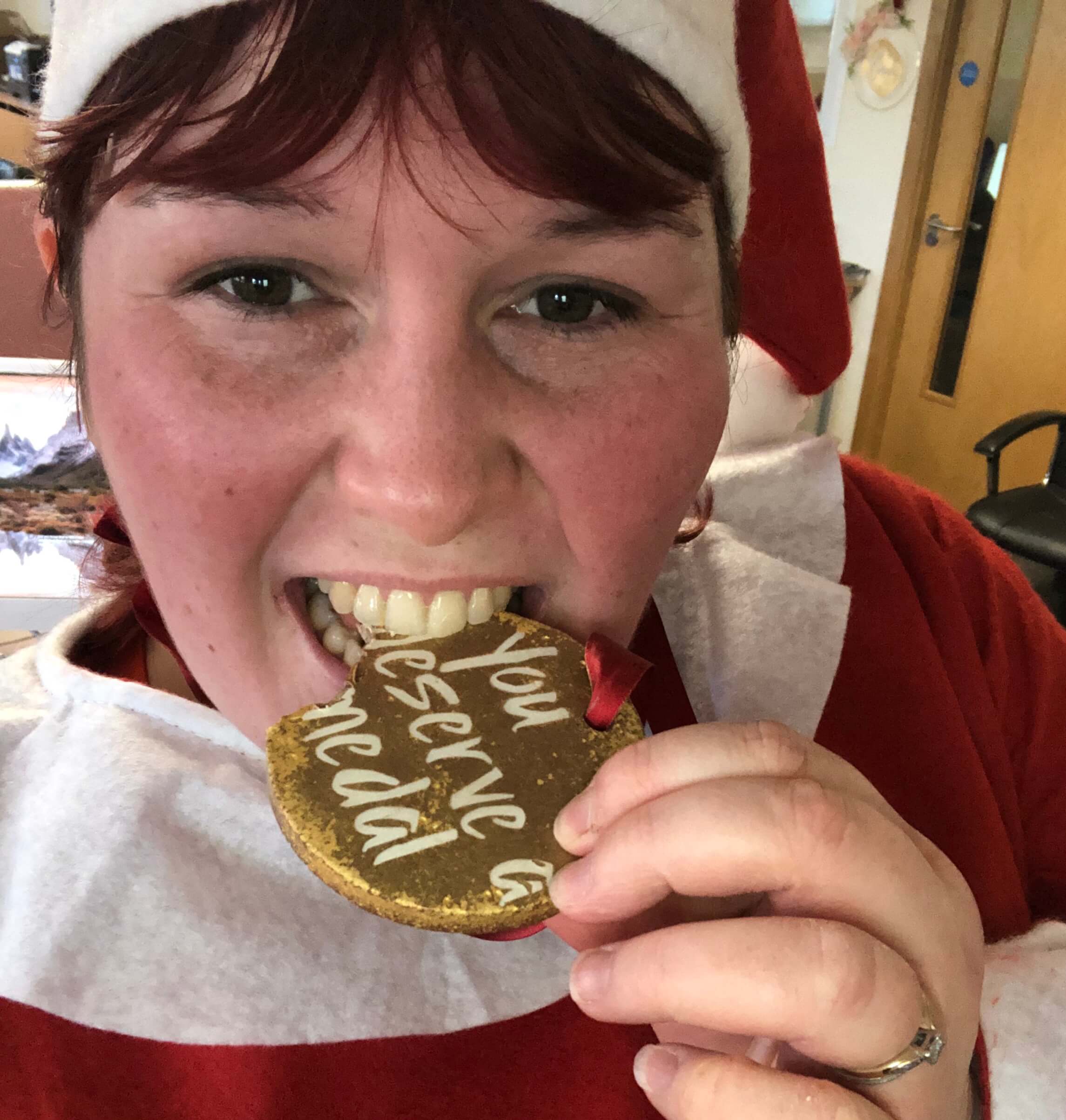 One of our scrumptious milk chocolate medals being devoured by a happy customer!