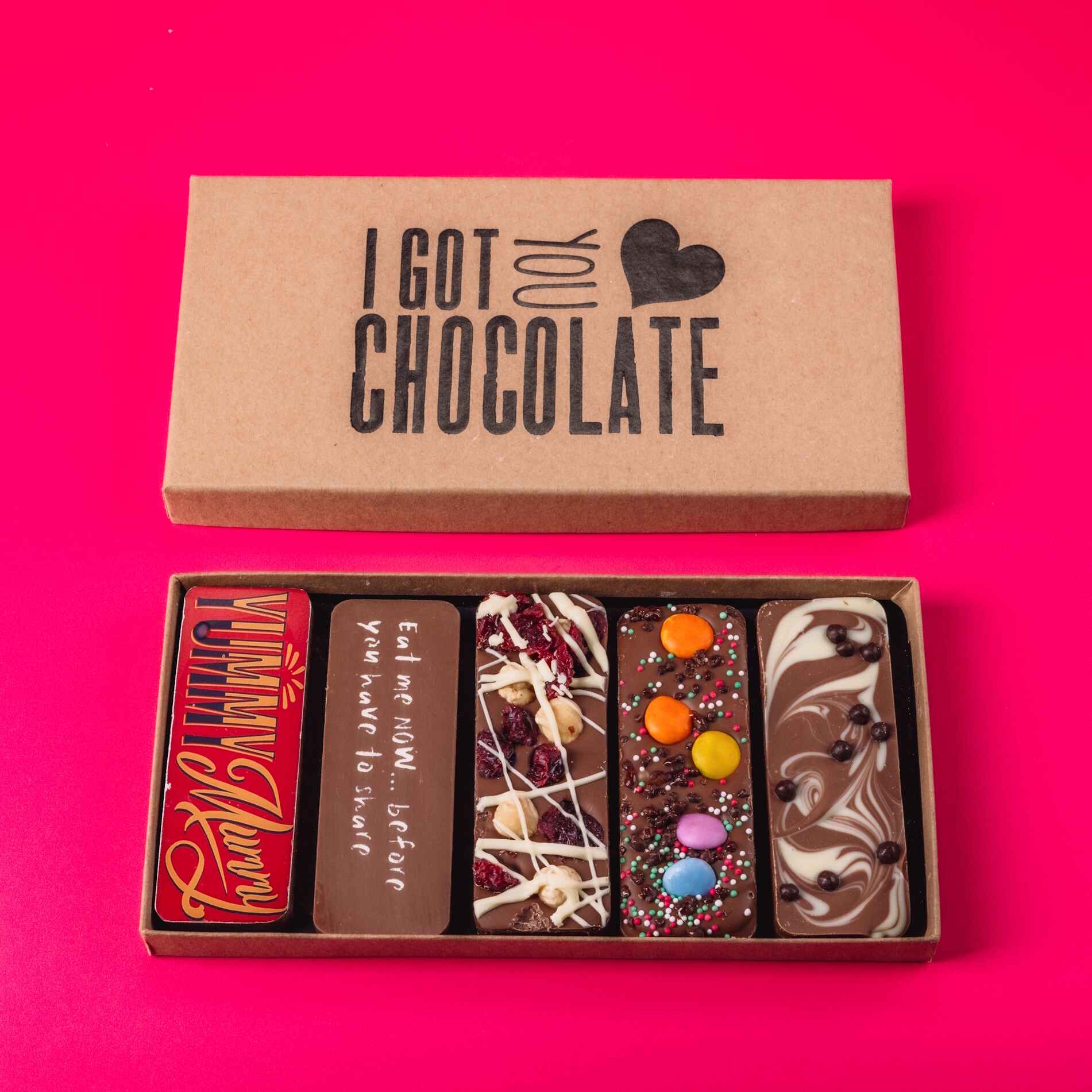 An open gift box featuring five milk chocolate bars. Presented in a high quality gift box with a “I Got You Chocolate” motif.  Makes a brilliant birthday gift for mum so long as she has a sense of humour.