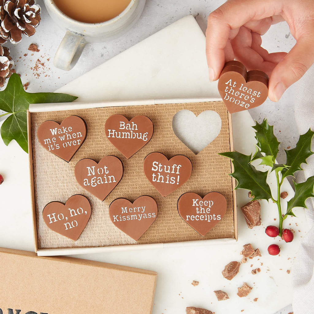 A box of heart-shaped milk chocolates each with a cheeky Christmas message like “Bah Humbug” and “Wake me when it’s over” – the perfect funny secret Santa gift for anyone feeling a bit jaded.
