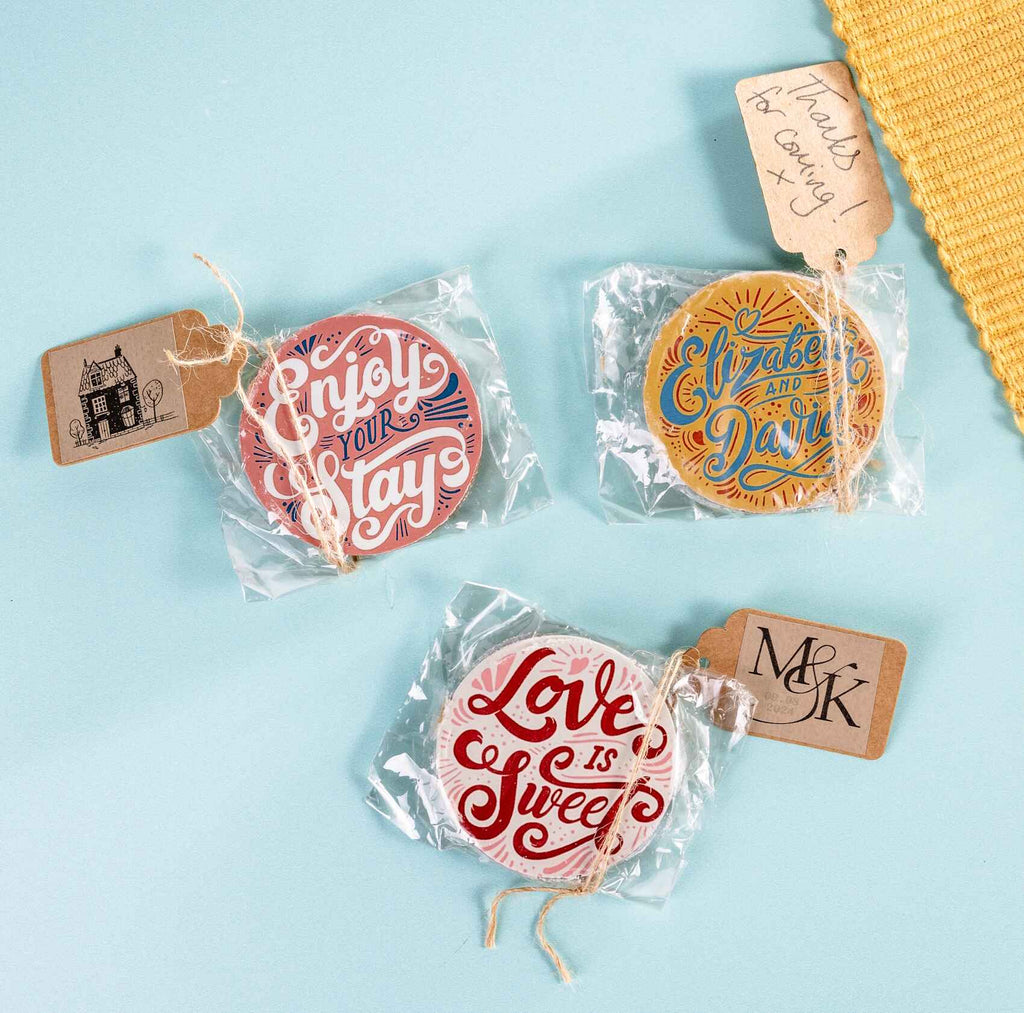 A selection of personalised chocolate discs with tags in clear packaging