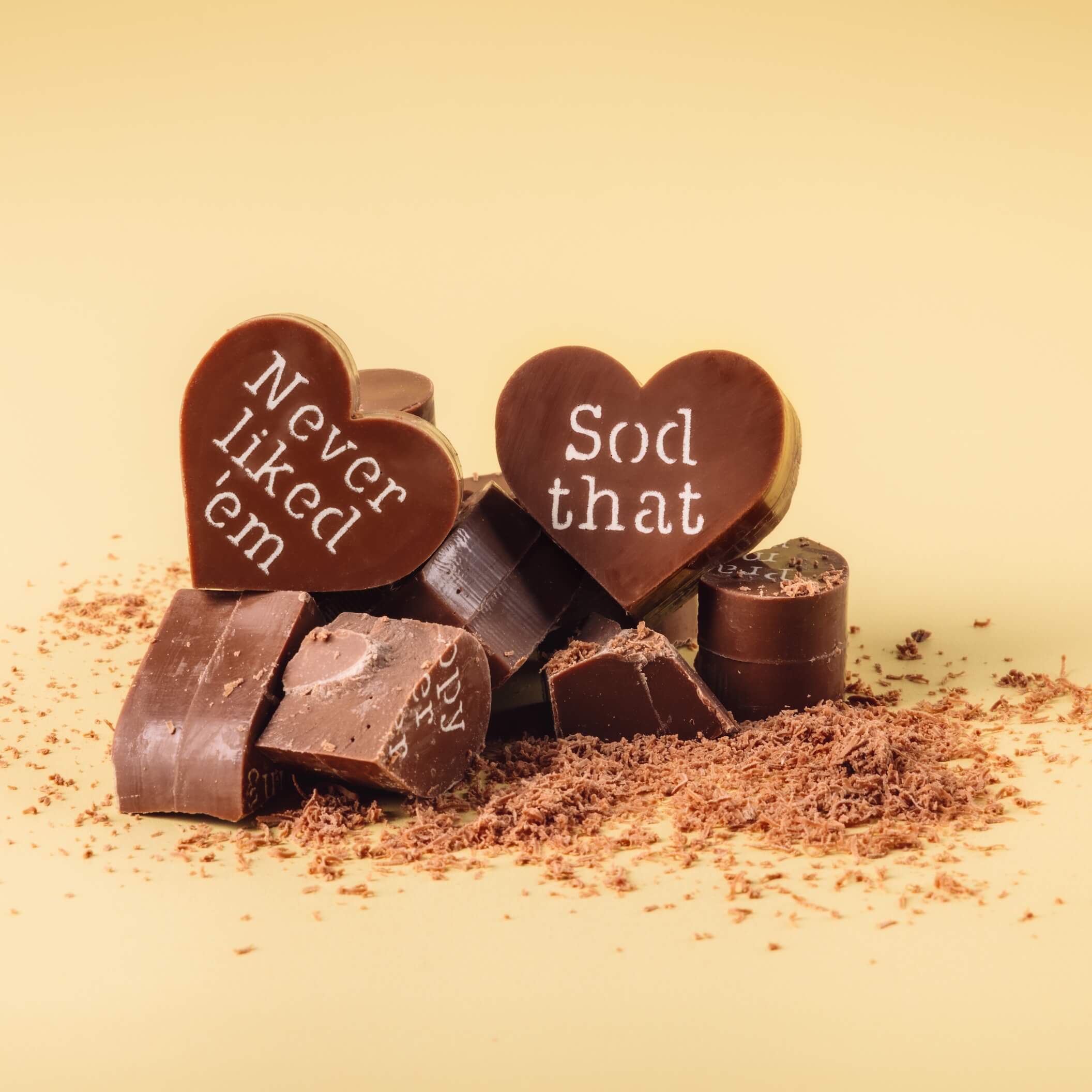 Funny Break Up Gifts - a close up of the chunky chocolate hearts with cheeky messages like 'Never liked 'em' and 'Sod that'