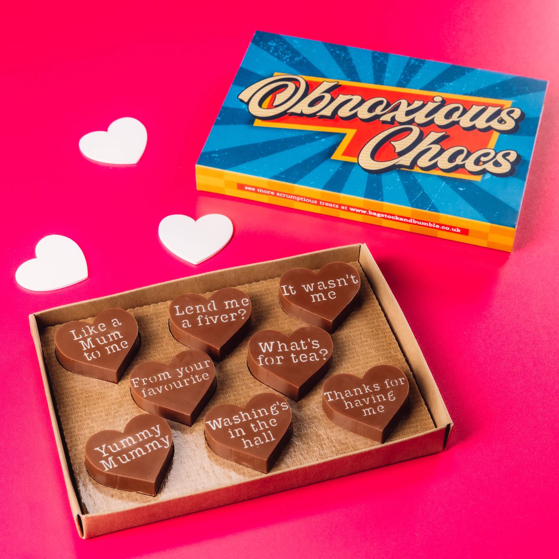 Mum Obnoxious Chocs from Bagstock & Bumble, pictured with vibrant vintage-style packaging, ready to gift to the slightly knackered superhero in your life.