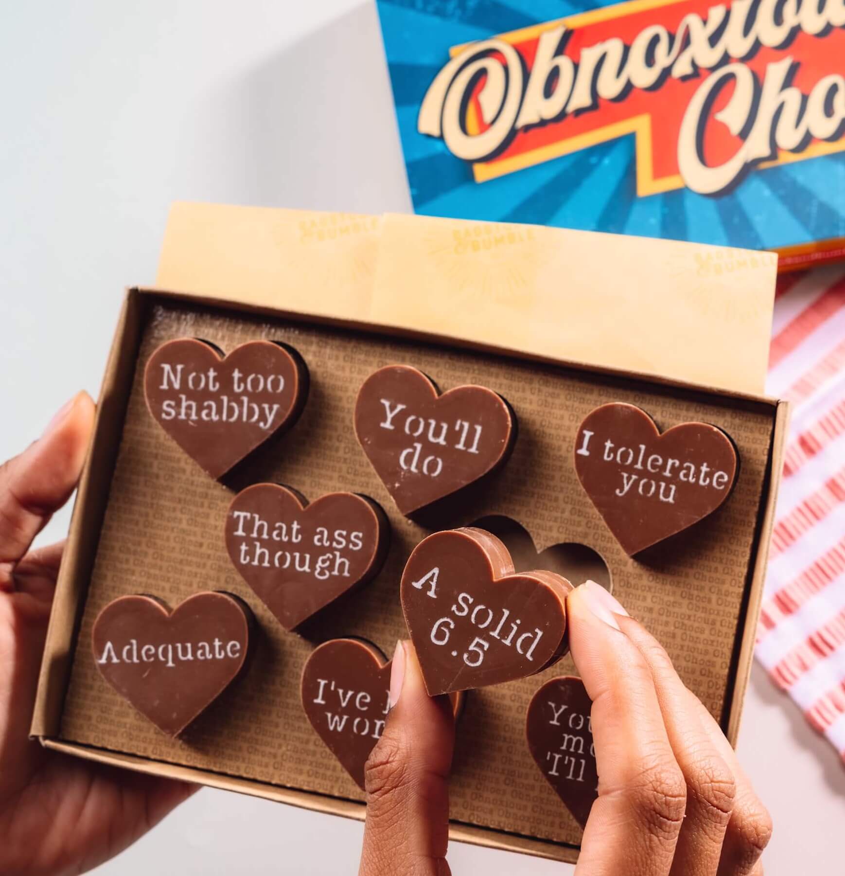 Funny Gift for Boyfriend or Girlfriend - Box of funny Valentine’s chocolates with cheeky messages - perfect for a gift that says ‘romance is overrated, but chocolate isn’t'
