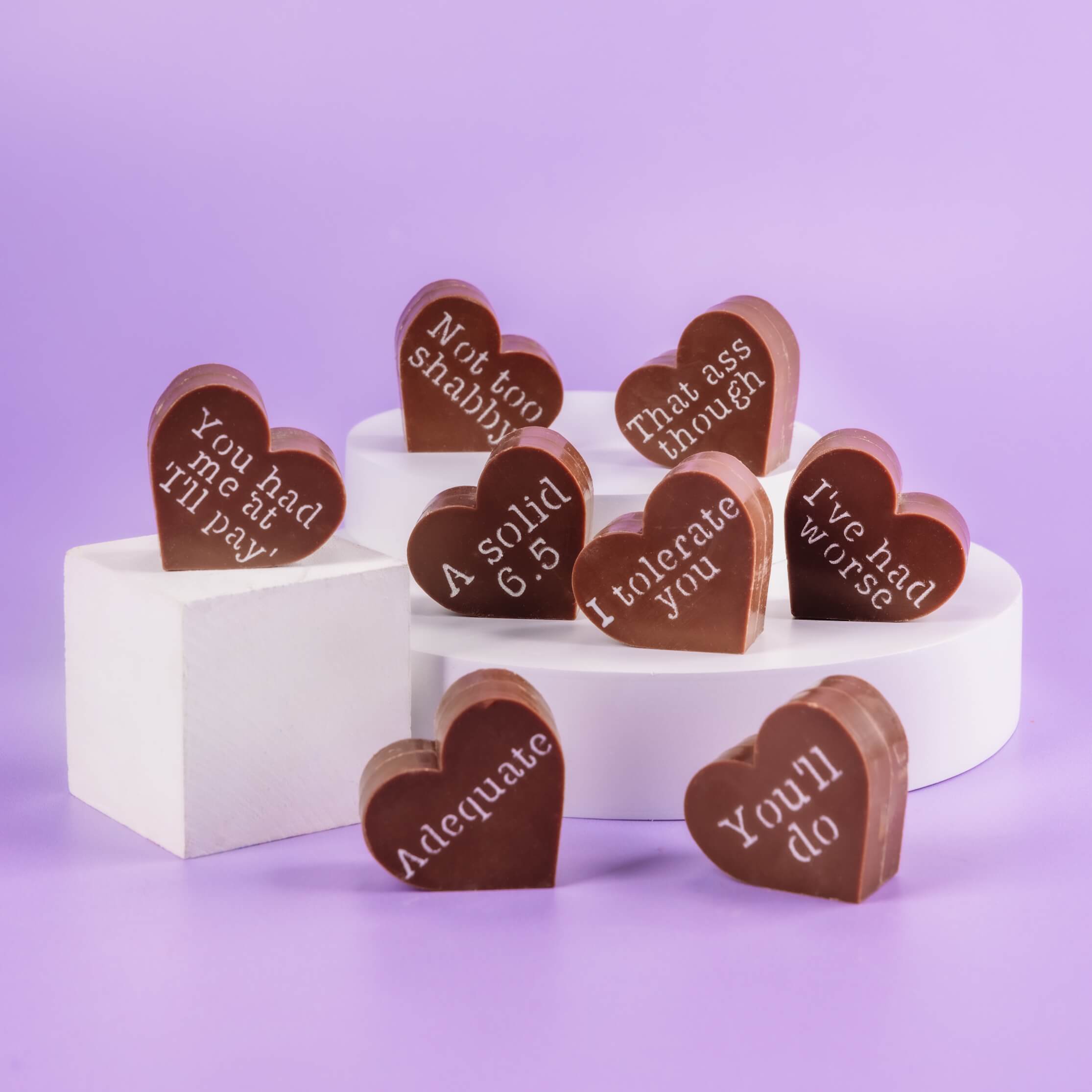 Unique gifts boyfriend:  Heart-shaped chocolates with witty, brutally honest messages.  A funny Valentine’s gift for men who prefer sarcasm over sweet nothing