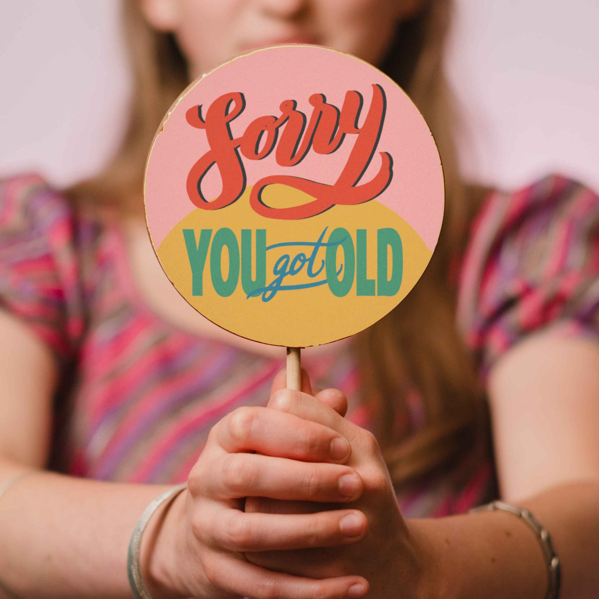 A retro styled giant chocolate lolly with a 'Sorry You Got Old' birthday message