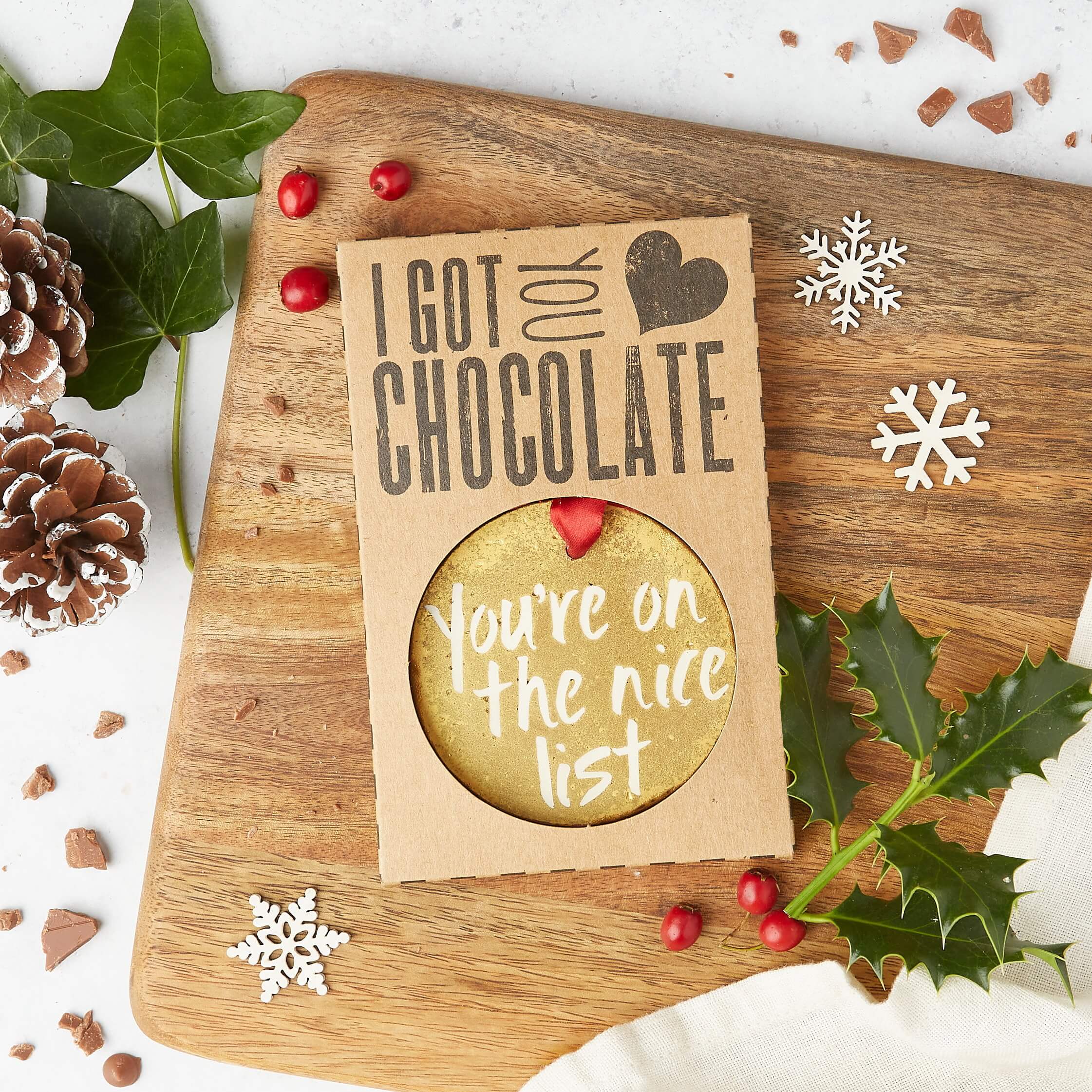 A boxed nice list medal made of gold-dusted chocolate, presented in Bagstock & Bumble’s eco-friendly packaging – festive, funny, and good for your gifting karma.