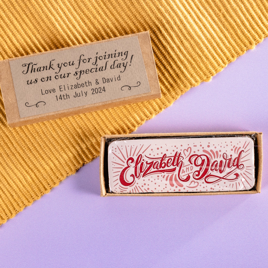 Personalized wedding chocolate personalised with Elizabeth and David typography and pictured with a 'Thank you for joining us on our special day!' box.
