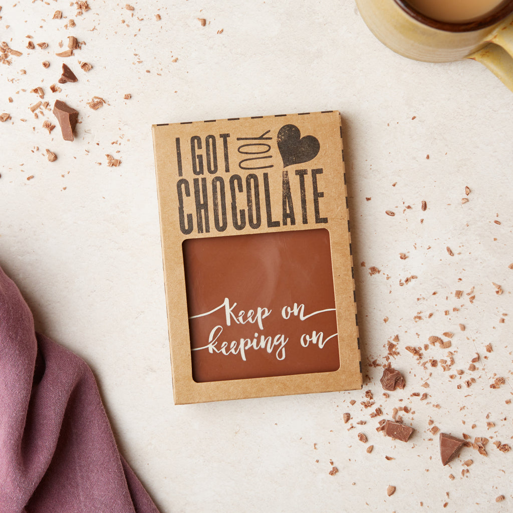 Bagstock & Bumble's 'I got you chocolate' styled gift packaging containing a 'Keep on keeping on' chocolate bar