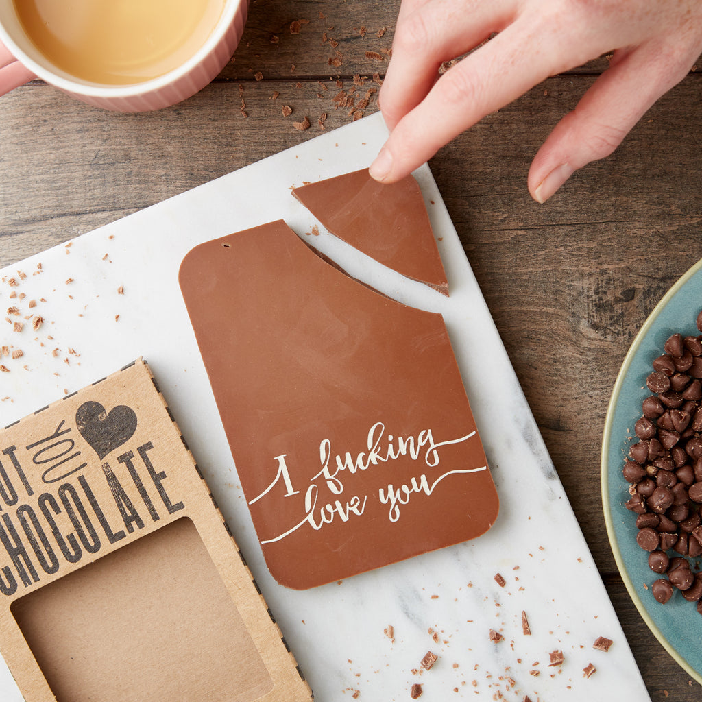 Belgian milk chocolate bar decorated with a cheeky 'I fucking love you' message in coloured cocoa butter
