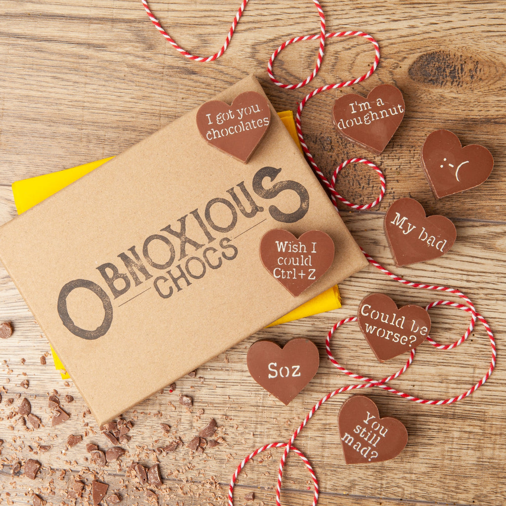 Obnoxious Chocs - a selection of funny sorry messages decorating chocolate hearts.  These messages are:  'I got you chocolates'; 'I'm a doughnut'; ':-('; 'Wish I could Ctrl+Z'; 'My bad'; 'Could be worse?'; 'Soz'; and 'You still mad?'.