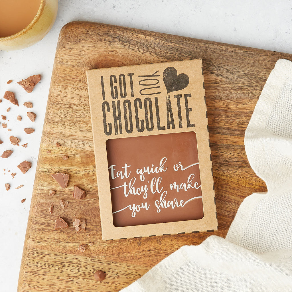 Chocolate bar in 'I got you chocolate' gift box with 'Eat quick or they'll make you share' message