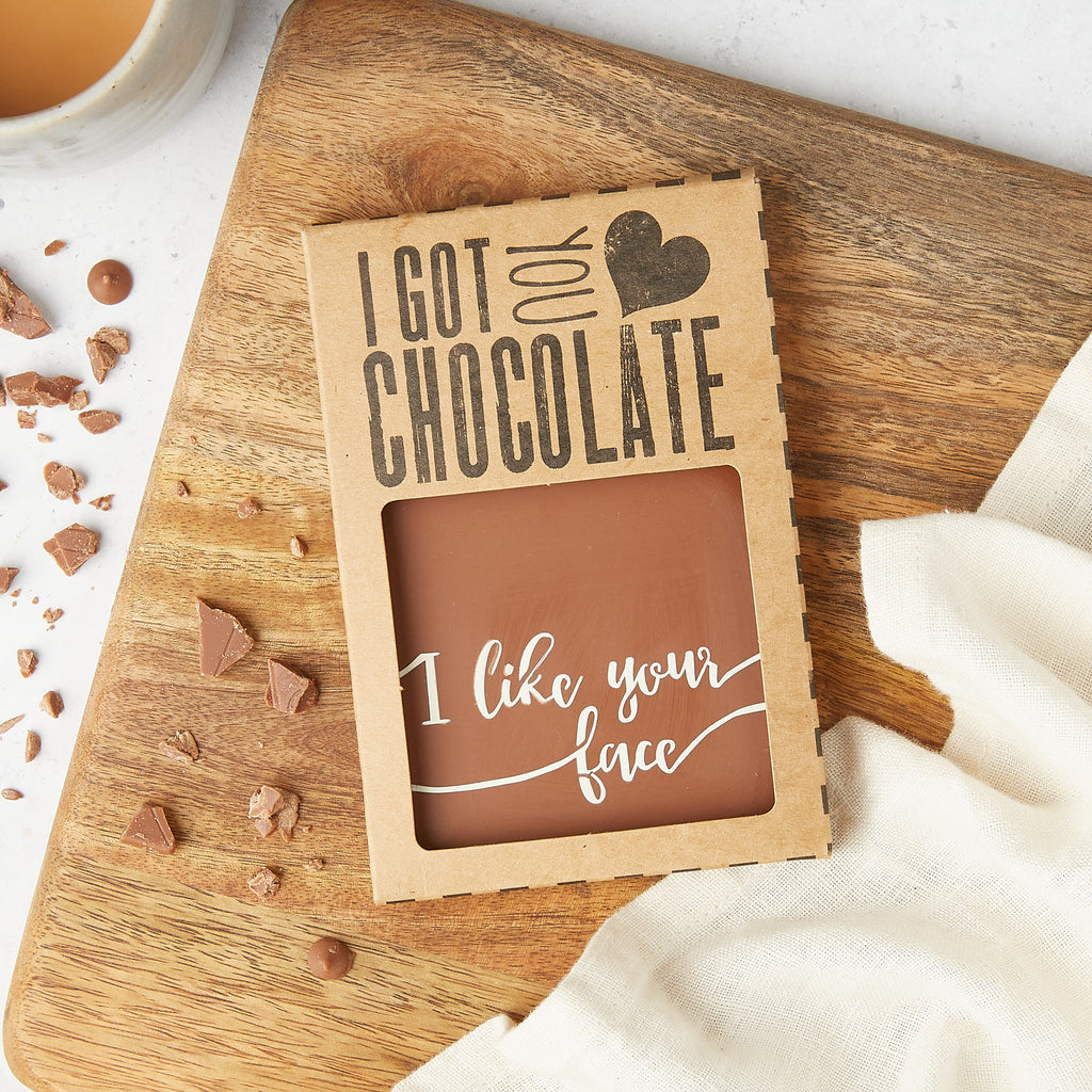 A custom made 'I got you chocolate' gift box containing an 'I like your face' chocolate bar