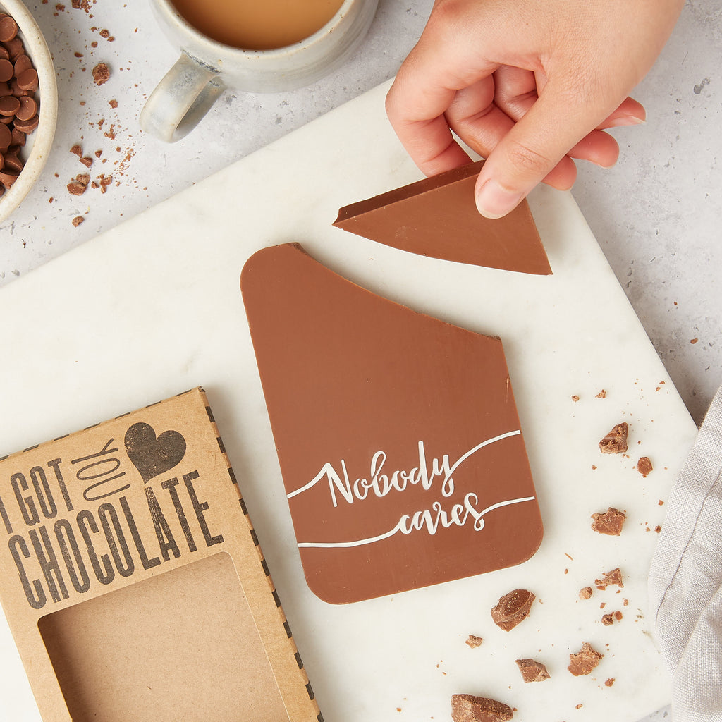 Image of a Belgian chocolate bar decorated with a 'Nobody cares' message
