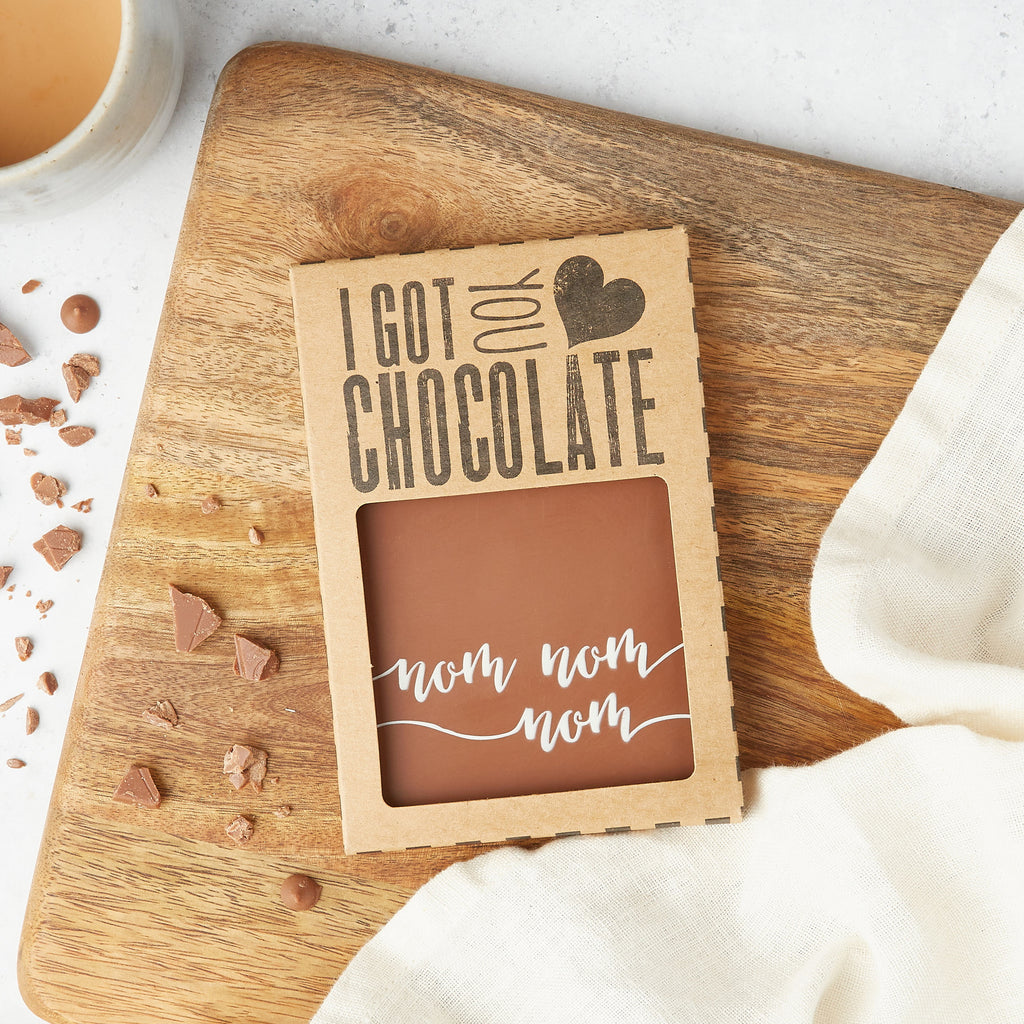Bespoke 'I got you chocolate' gift packaging containing a milk chocolate 'nom nom nom' bar